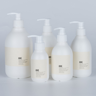 Tela de impressão 100ML 200ML 250ML 300ML 500ML Flasca de xampu de plástico PE redonda Flasca de lavagem manual